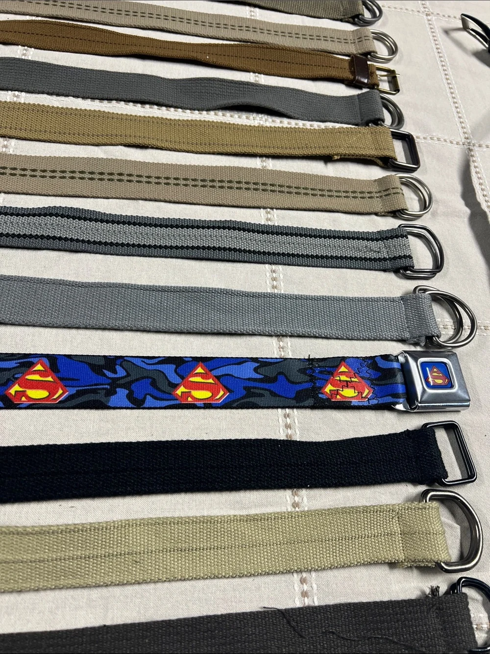 15 Mixed Canvas D-Ring Belts - Neutral & Black with Superman Accent